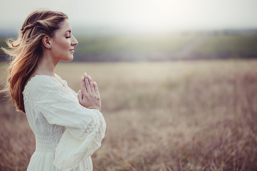 Beautiful woman in a meadow