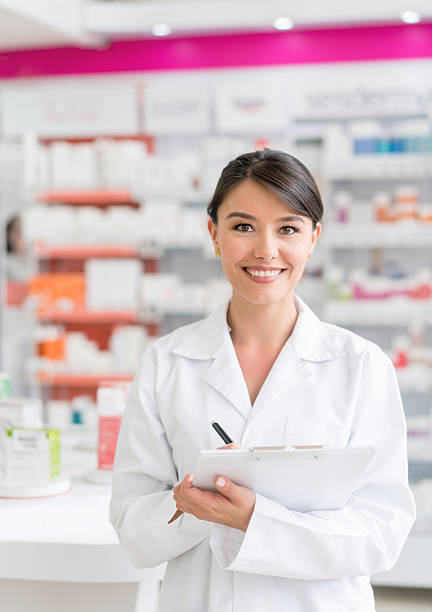 istock Pharmacist working at a drugstore 610254038