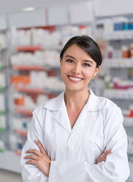 istock Pharmacist working at a drugstore 610254138