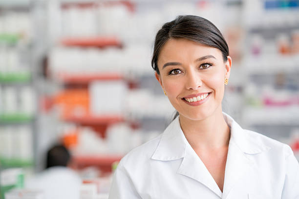 istock Pharmacist working at a drugstore 610254360