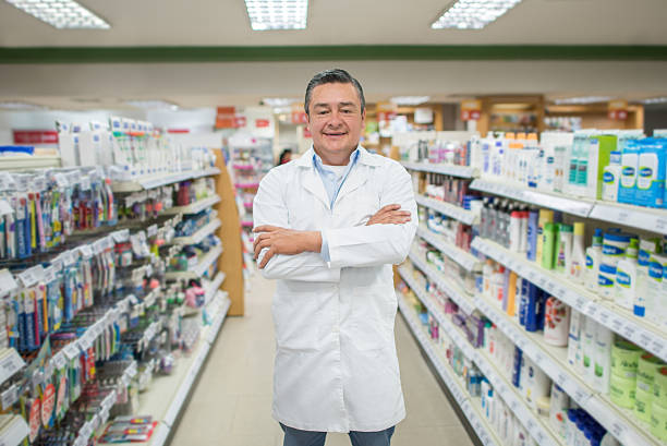 istock Pharmacist at a drugstore 610254370
