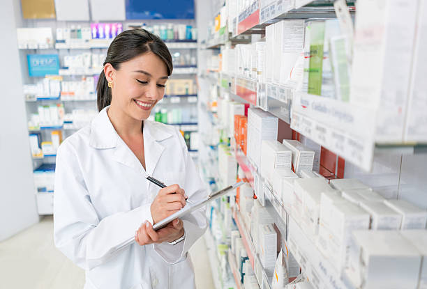 istock Pharmacist working at a drugstore 610254416
