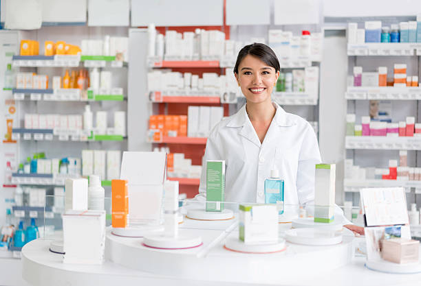 istock Pharmacist working at a drugstore 610254466