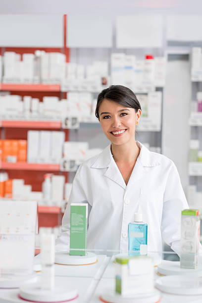 istock Pharmacist working at a drugstore 610254472