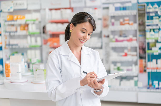 istock Pharmacist doing the inventory at a drugstore 610254490