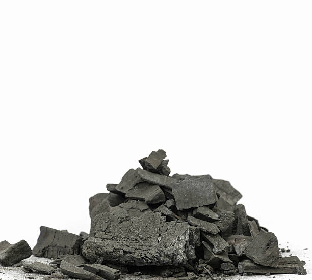 istock pile of charcoal on white background 610257014
