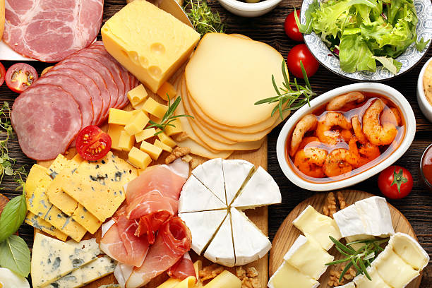 istock Board of various types of cheese and appetizers set 610258232