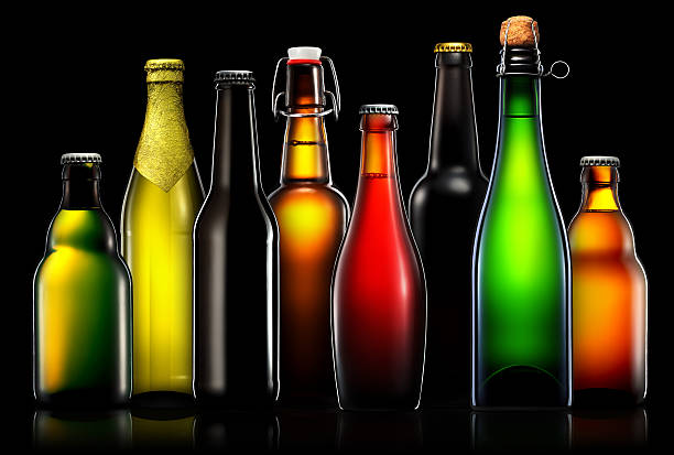 istock Set of beer bottles isolated on black background 610261136