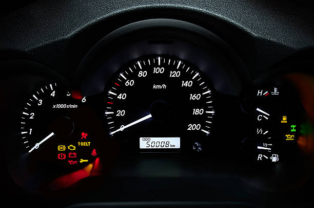 Car's dashboard Illuminated car's dashboard car odometer stock pictures, royalty-free photos & images