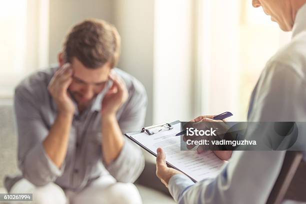 Man At The Psychotherapist Stock Photo - Download Image Now - Mental Health, Mental Health Professional, Healthcare And Medicine