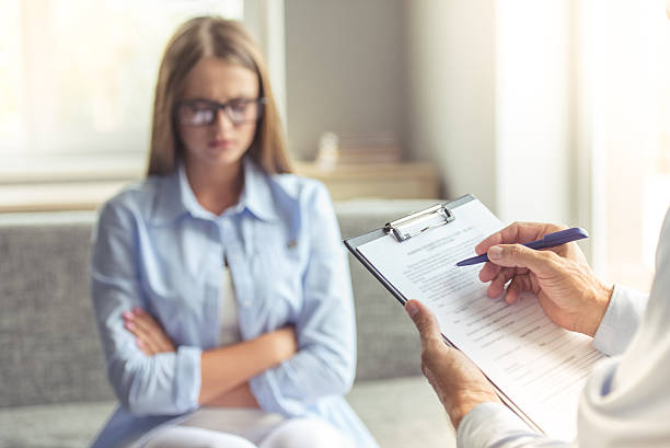 istock Woman at the psychotherapist 610263318