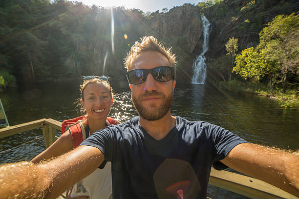 self portrait of young couple at the waterfalls - wangi falls imagens e fotografias de stock