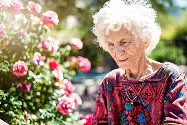 istock Beautiful Pensive Senior Woman Outdoors, Lost in Thoughts 610414678