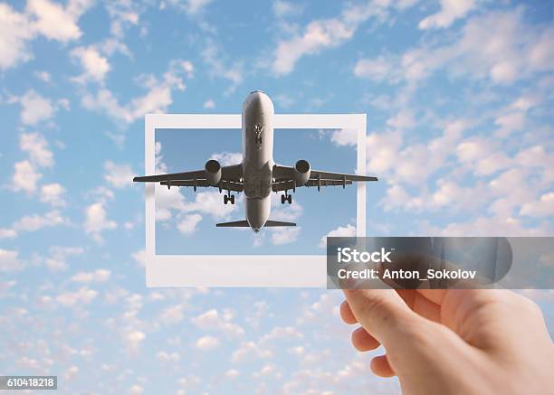 Holding Instant Photo Stock Photo - Download Image Now - Airplane, Instant Print Transfer, Photography