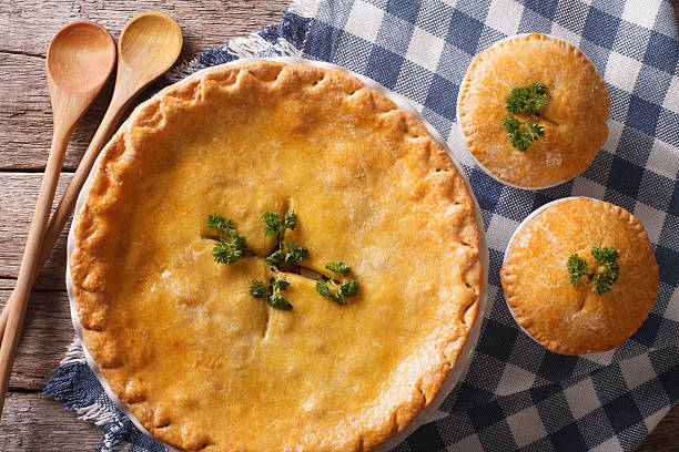 istock Golden Chicken pot pie in the baking dish closeup. Horizontal 610418536