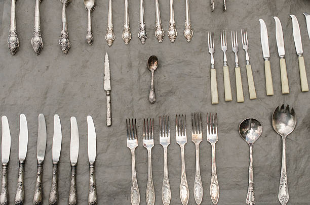 collection of cutlery on a street market collection of cutlery on a street market kerbstone stock pictures, royalty-free photos & images