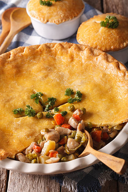 istock Big Chicken pot pie close-up in baking dish. vertical 610420132