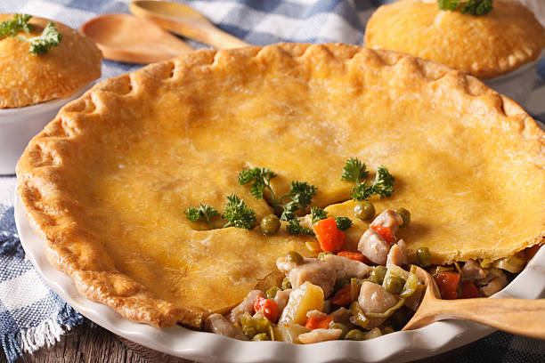 istock Big Chicken pot pie macro in baking dish. horizontal 610420426