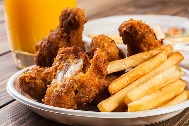 istock Crisp crunchy chicken wings with chips 610420510