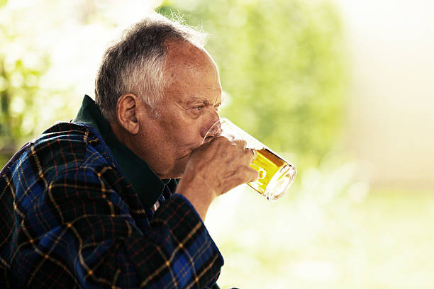 Drinking beer stock photo