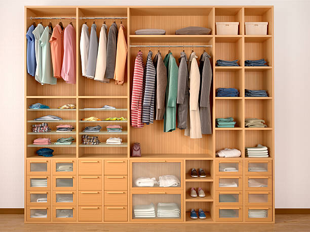 istock wooden wardrobe closet full of different things. 610424214