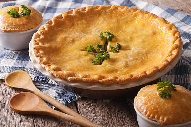 istock Hot delicious Chicken pot pie in the baking dish closeup 610424746