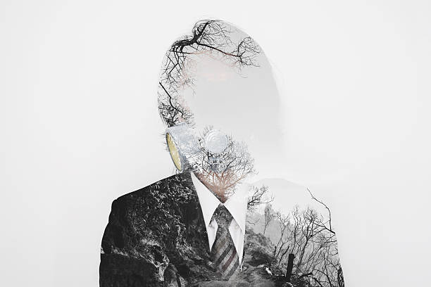 istock Double exposure, businessman wearing toxic protection mask with dead environment 610425004