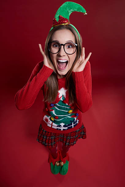 istock Shouting woman on red background 610425046