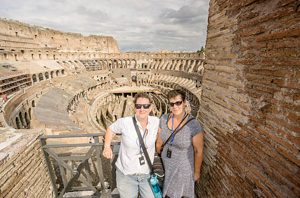 istock Tourists at the Coliseum in Rome 610425498
