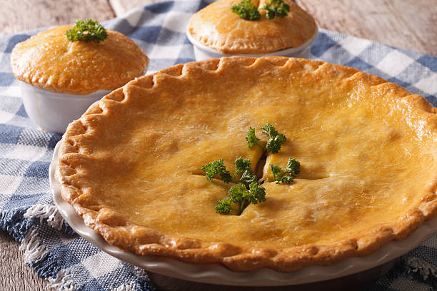istock Freshly baked Chicken pot pie in the baking dish closeup 610426022