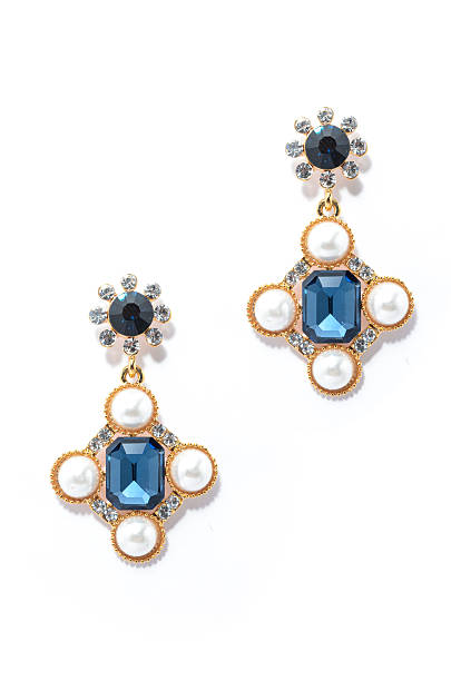 istock earrings with sapphire and pearls isolated on white background 610428492