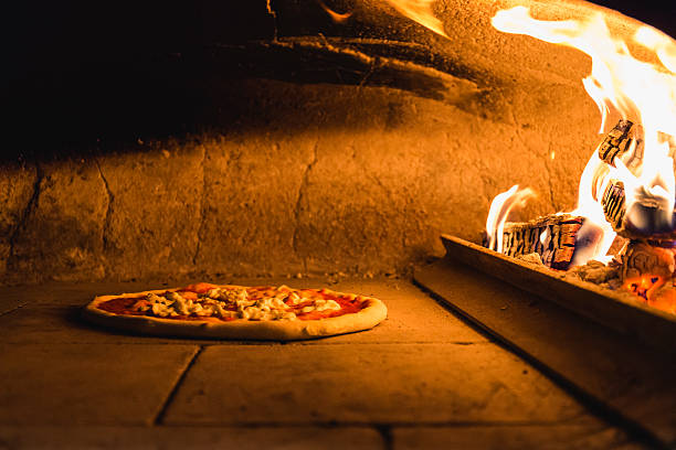 istock Pizza with wood oven 610431338