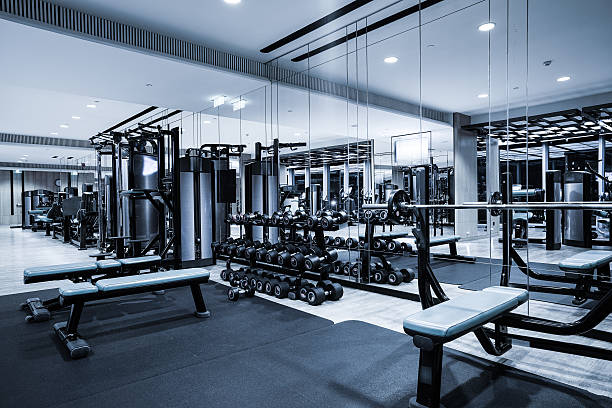 Fitness club in luxury hotel interior. Fitness club in luxury hotel interior.GYM concept. health club stock pictures, royalty-free photos & images