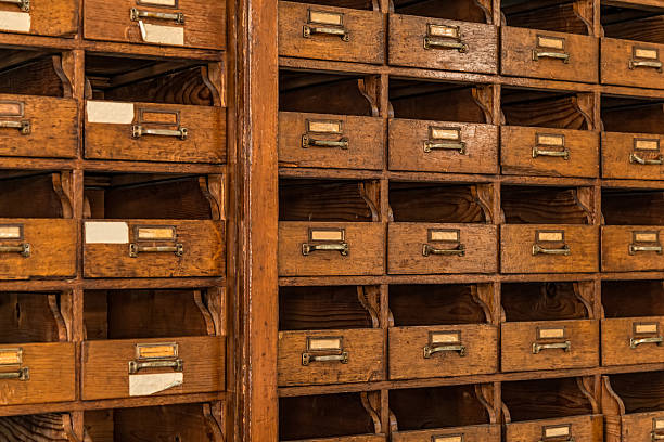 istock vintage card index cabinet - office archive 610432316