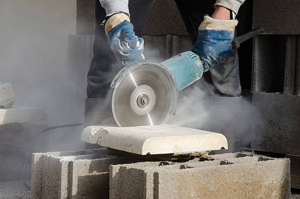 istock Grinder, Electric saw, Dust, Cut, Protective gloves, Blade 610433448