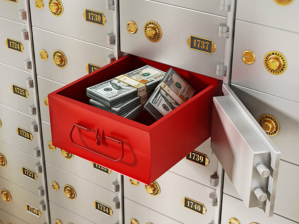 istock Red box with money lots behind open safety deposit box 610433486