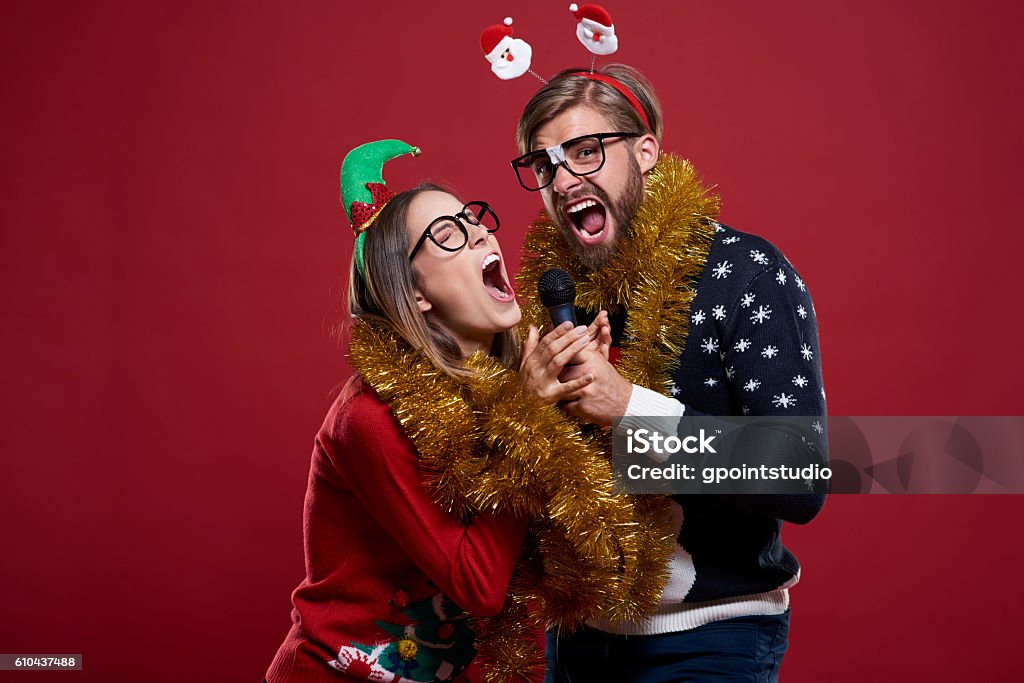 Great fun while having karaoke performance Singing Stock Photo