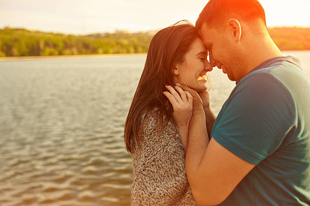 istock Couple loving each other outdoors. 610438084