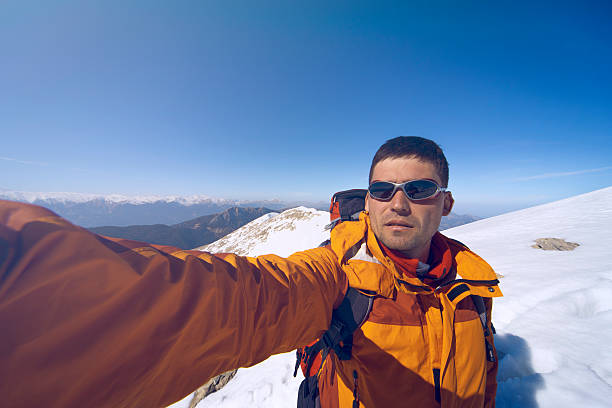 istock Winter hiking in the mountains with a backpack. 610438704