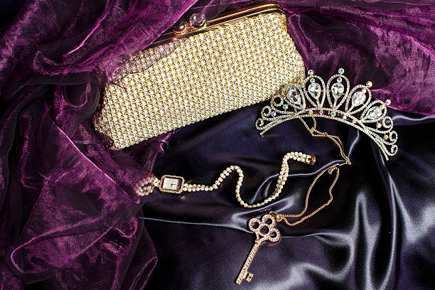 istock set of women's accessories on a silk background 610438734
