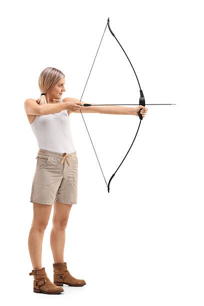 istock Woman aiming with an arrow and a bow 610440028