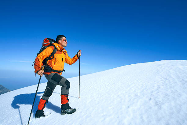 istock Winter hiking in the mountains with a backpack. 610440518
