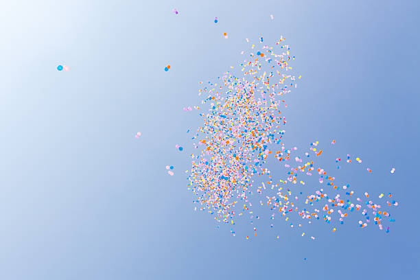 istock balloons flying in the sky 610440836