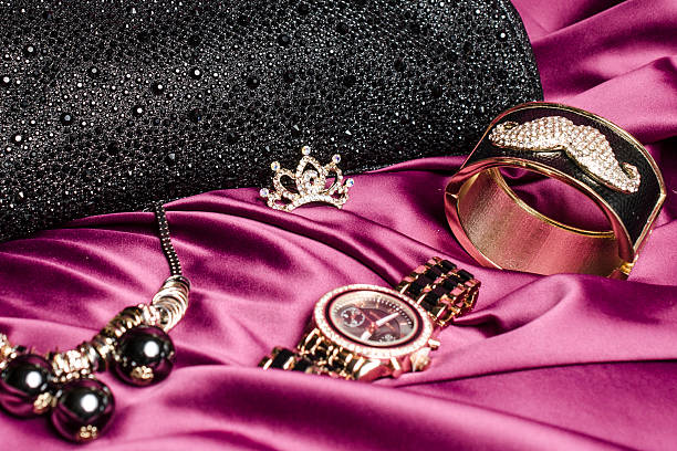 istock set of women's accessories on a silk background 610441646
