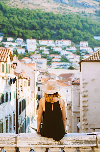 istock Woman in Dubrovnik 610441690