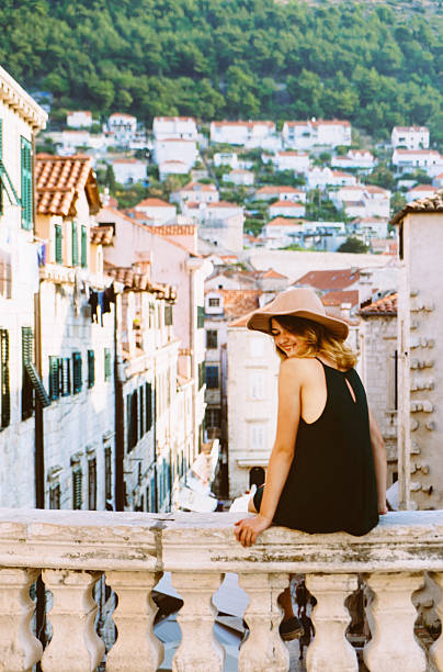 istock Woman in Dubrovnik 610441696