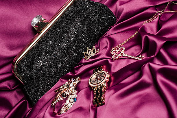 istock set of women's accessories on a silk background 610443004