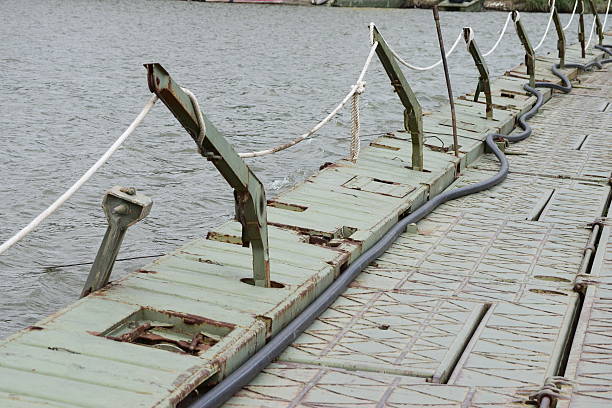 White rope as fence on the pontoon bridge