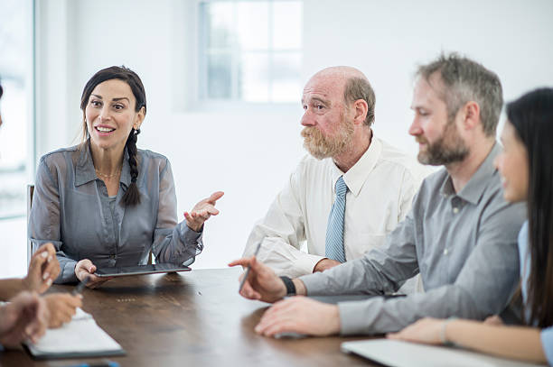istock Leading a Business Meeting 610443462