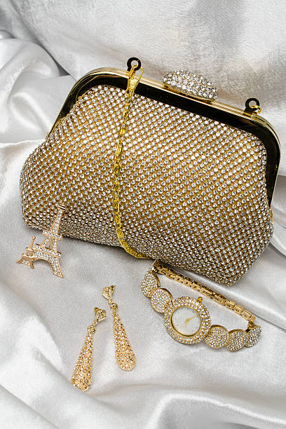 istock set of women's accessories on a silk background 610446000